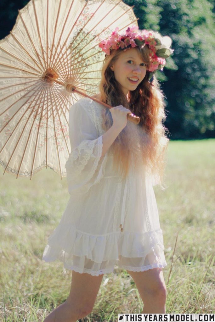Dolly Little With an Umbrella