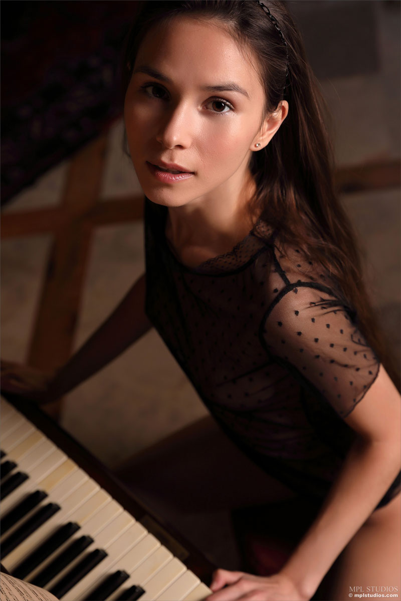 Leona Mia Strips by the Big Piano