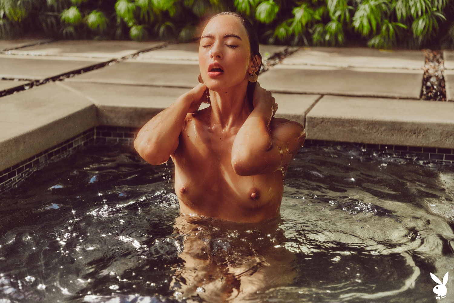 Genevieve Liberte Cools Down in the Pool