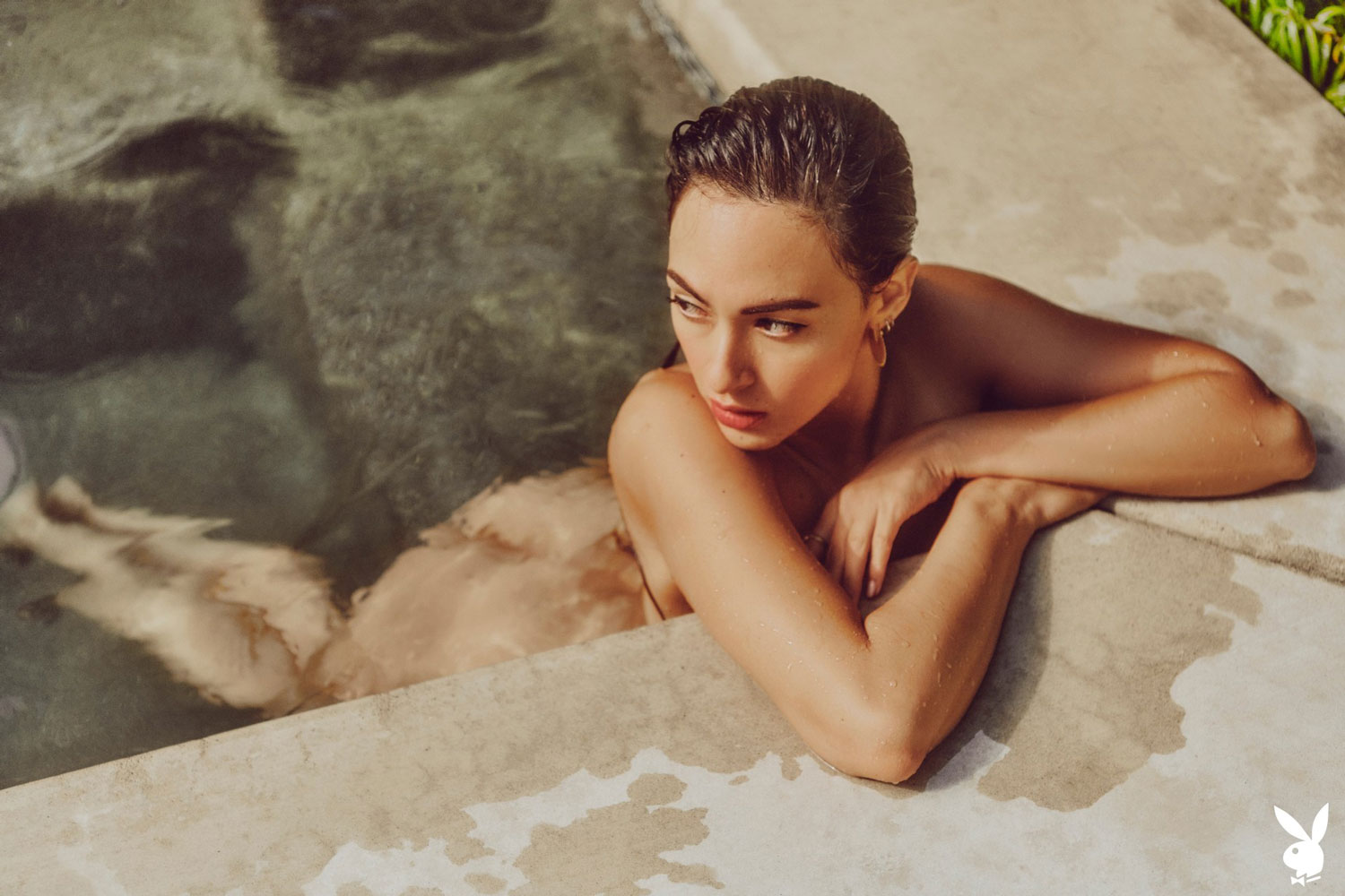 Genevieve Liberte Cools Down in the Pool