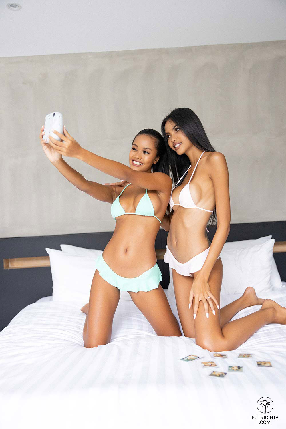 Putri Cinta Posing with her Friend in Bed