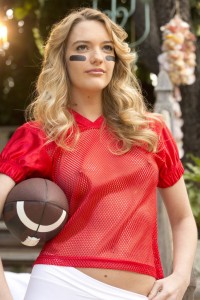 Kenna James Dressed in a Football Kit